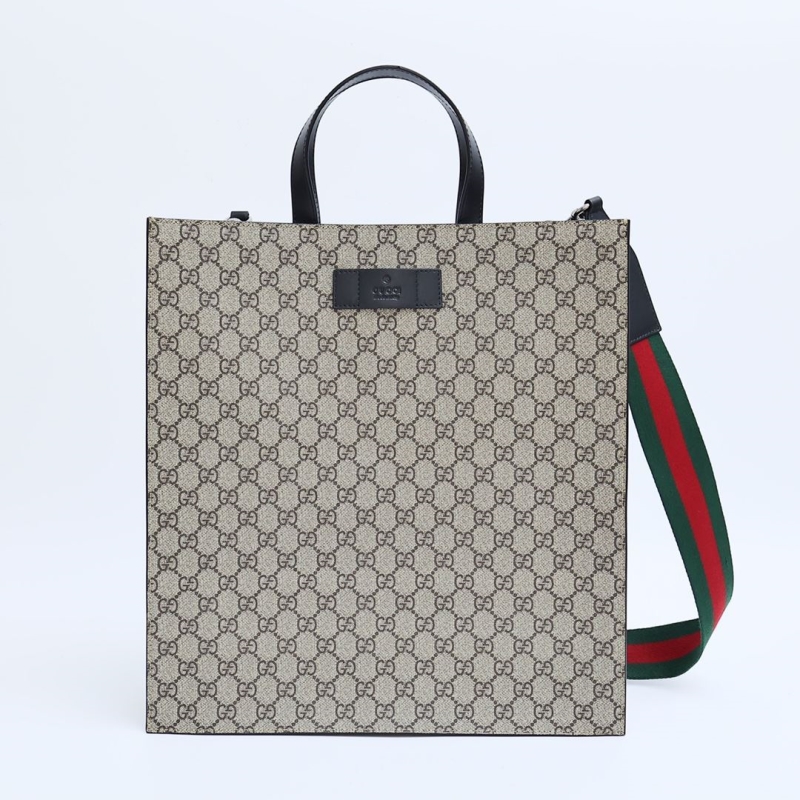 G*u*i shopping bags